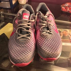 Pink nike running shoes